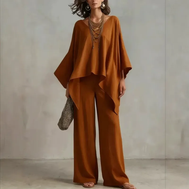 Conjunto fluido con poncho asimétrico