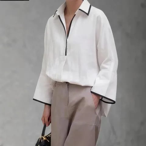 Blusa con vivos en contraste
