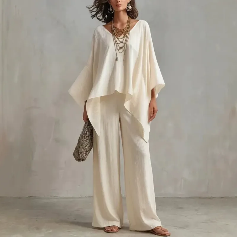 Conjunto fluido con poncho asimétrico