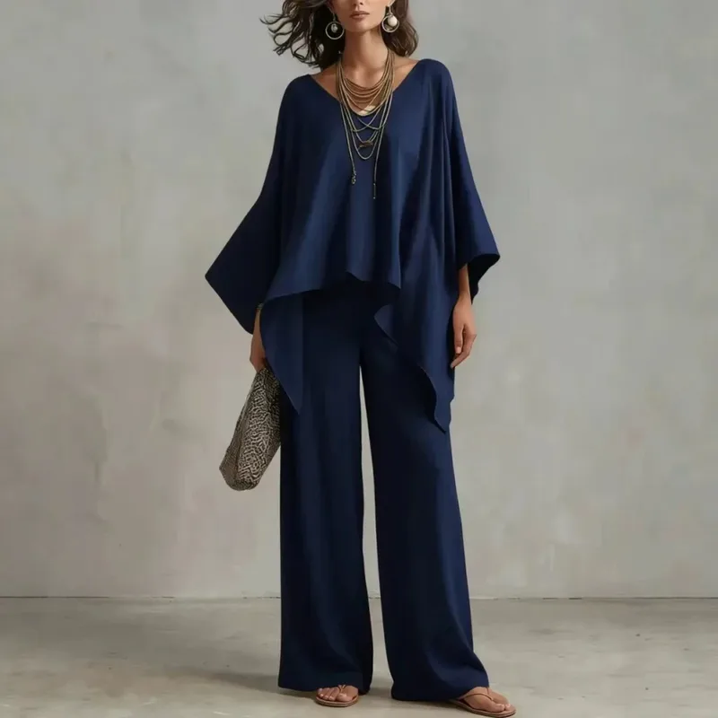 Conjunto fluido con poncho asimétrico